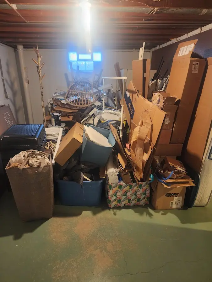 Roll-off dumpster container at job site for Yard Waste Dumpster Rental in Otsego